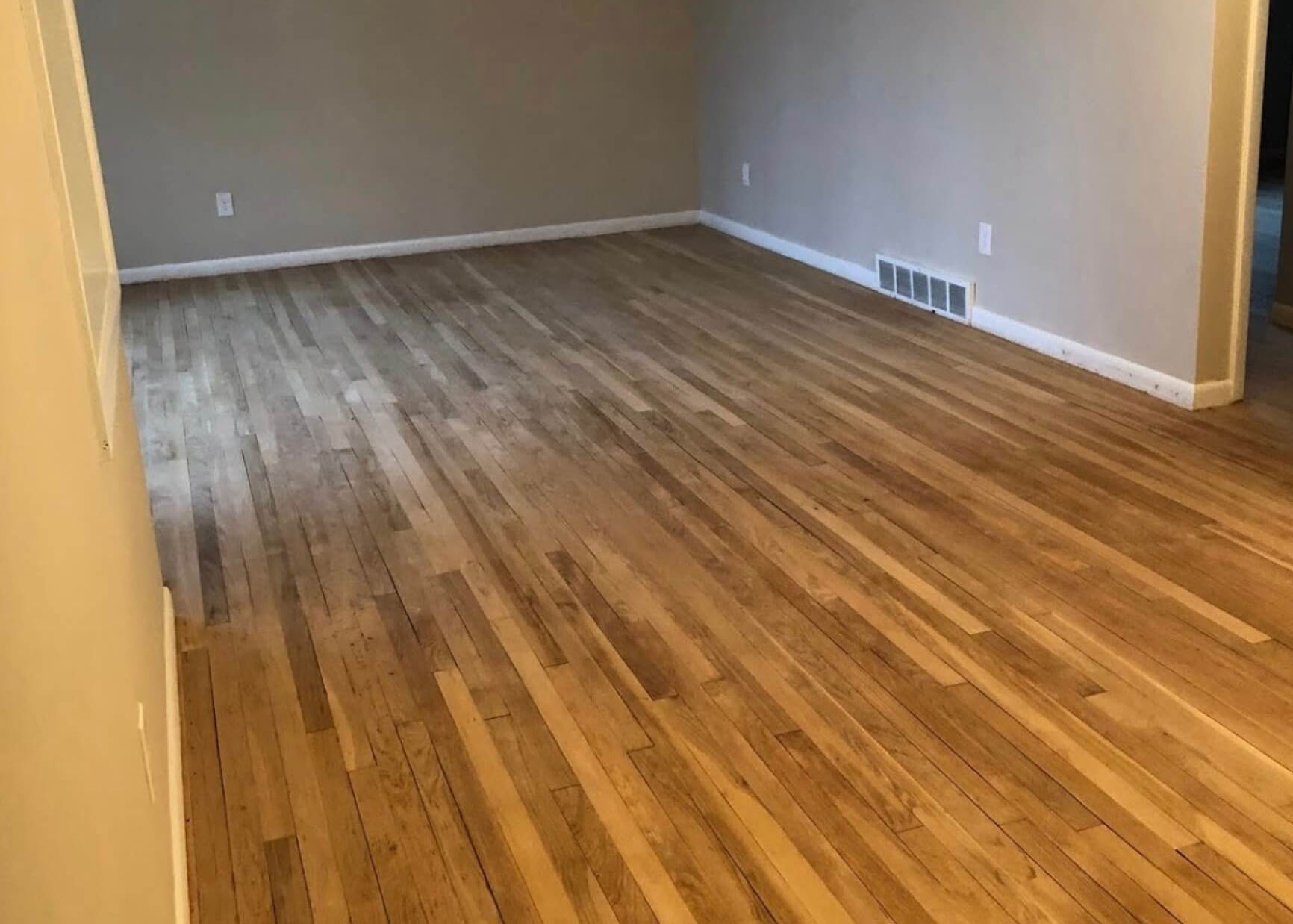 a floor in need of a new stain color